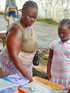 Abibatu Nelson with a child