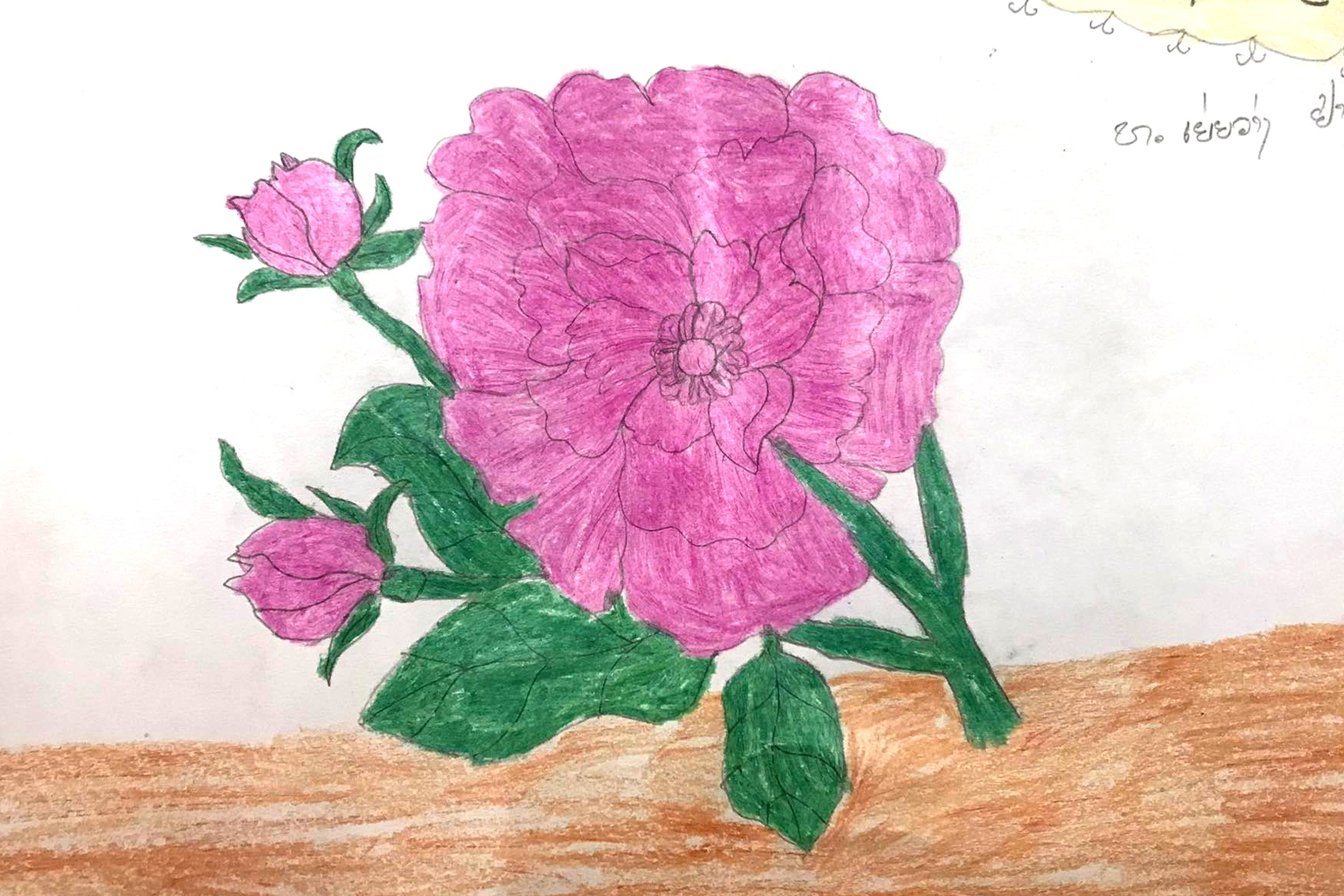 children's drawing of a red flower