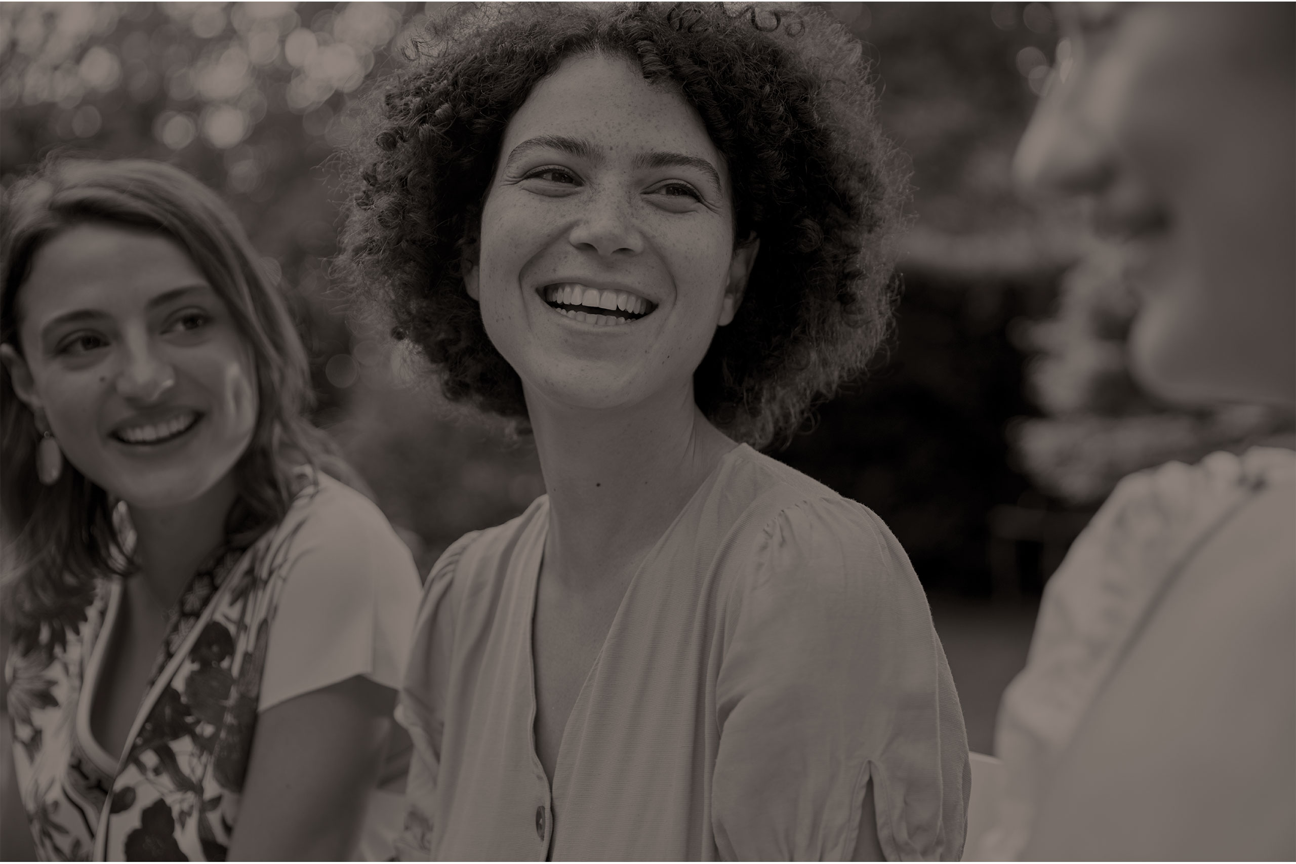 three women smiling